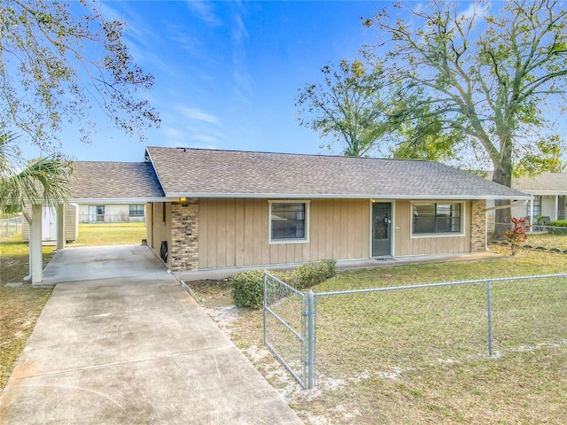 ranch-style home featuring a front yard