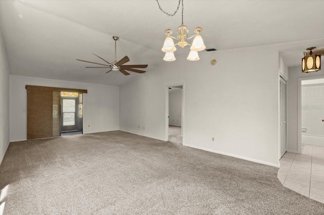 unfurnished living room featuring visible vents, carpet floors, and ceiling fan with notable chandelier