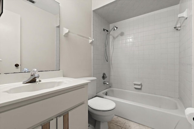 bathroom featuring vanity, toilet, shower / tub combination, and tile patterned flooring