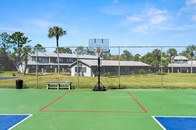 view of sport court featuring community basketball court and fence