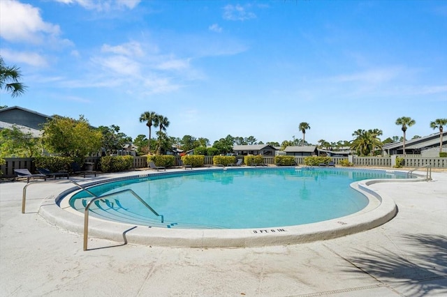 pool featuring fence