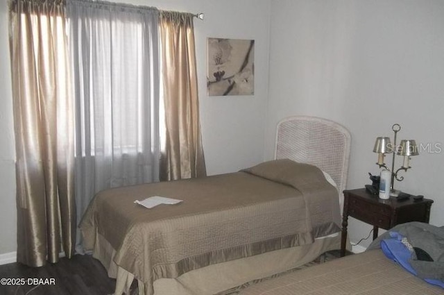 bedroom featuring hardwood / wood-style floors