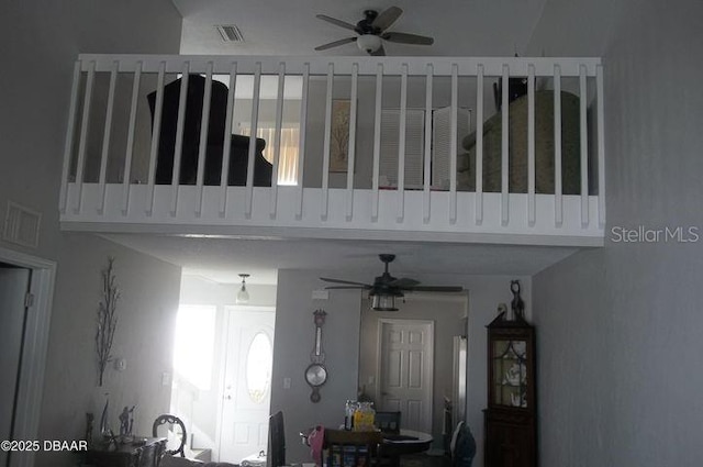 interior space with plenty of natural light and ceiling fan