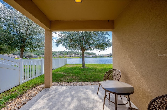 view of patio / terrace with a water view