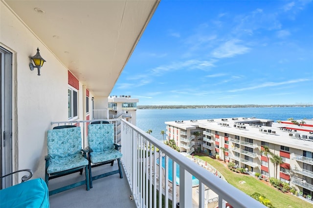 balcony featuring a water view