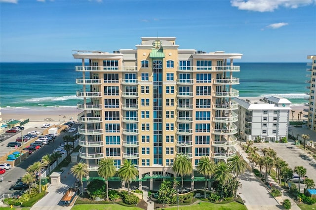 view of building exterior with a water view