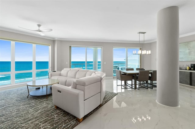 living area with marble finish floor, a water view, crown molding, and ceiling fan with notable chandelier