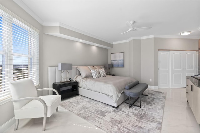 bedroom with baseboards, a ceiling fan, and crown molding