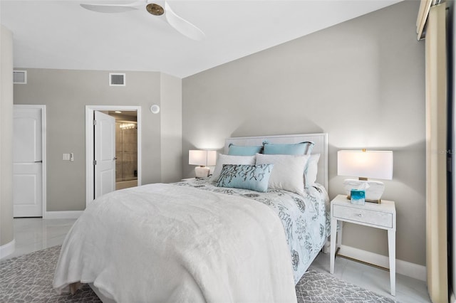 bedroom with a ceiling fan, visible vents, connected bathroom, and baseboards