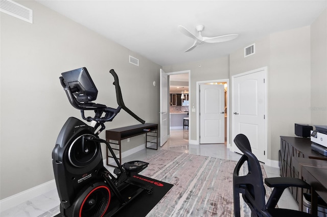 workout room with ceiling fan, visible vents, and baseboards