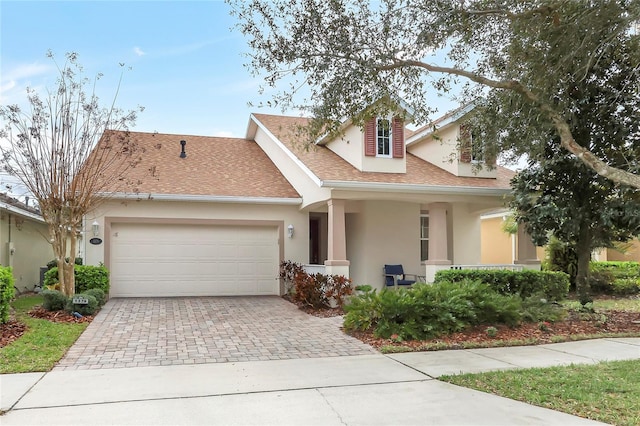 view of front of home with a garage