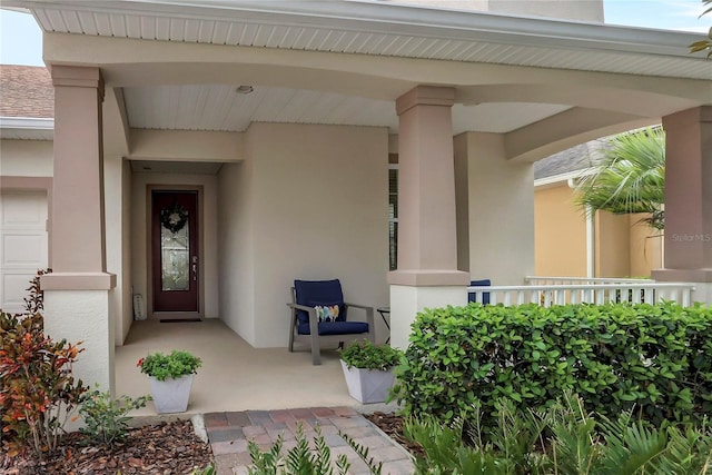 entrance to property with covered porch