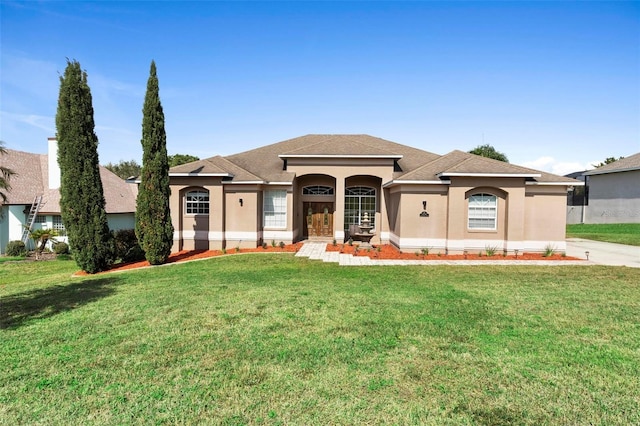 view of front of home featuring a front lawn