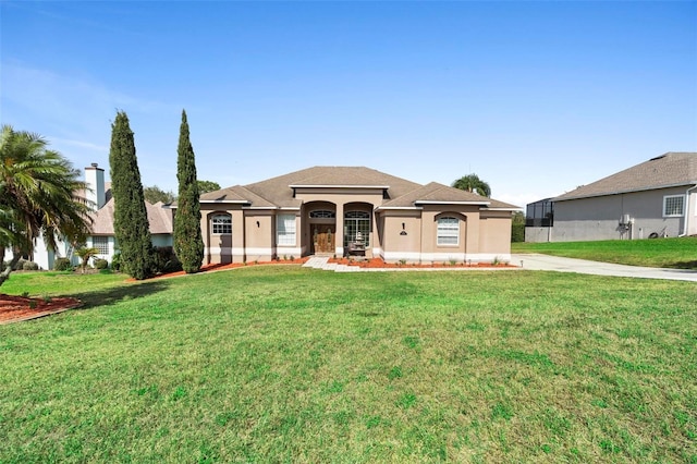 view of front facade with a front yard