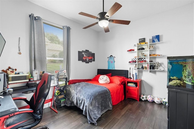 bedroom featuring ceiling fan and dark hardwood / wood-style floors