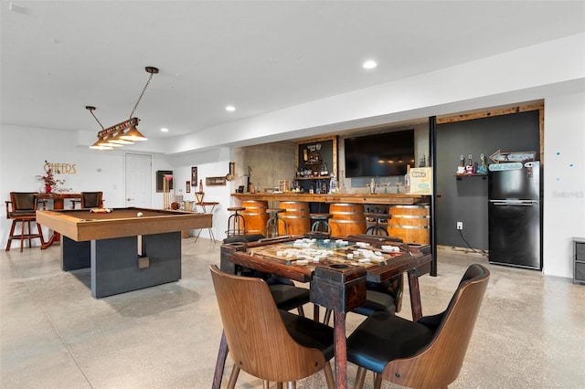 dining space with billiards and indoor bar