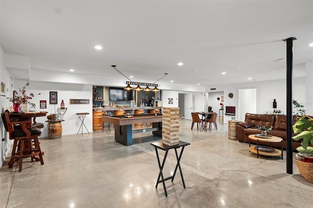 interior space featuring indoor bar