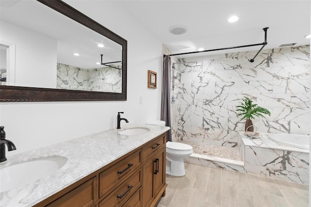 full bathroom featuring toilet, vanity, and plus walk in shower