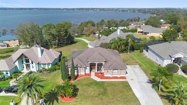 bird's eye view with a water view