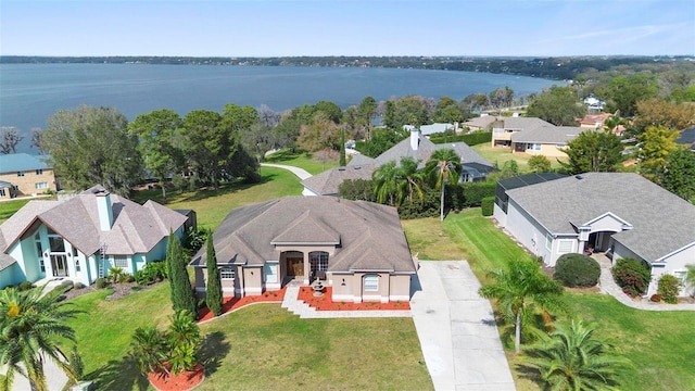 drone / aerial view with a water view