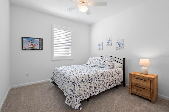 bedroom with ceiling fan and carpet flooring