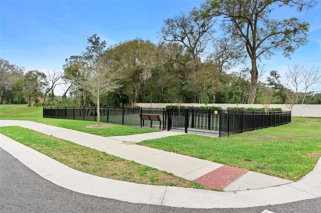 view of community featuring a lawn