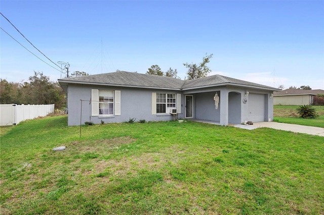 single story home with concrete driveway, an attached garage, fence, a front lawn, and stucco siding