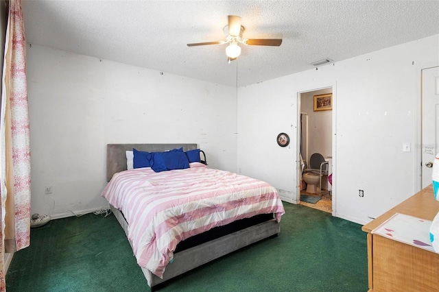 bedroom with a textured ceiling, dark colored carpet, ceiling fan, and visible vents