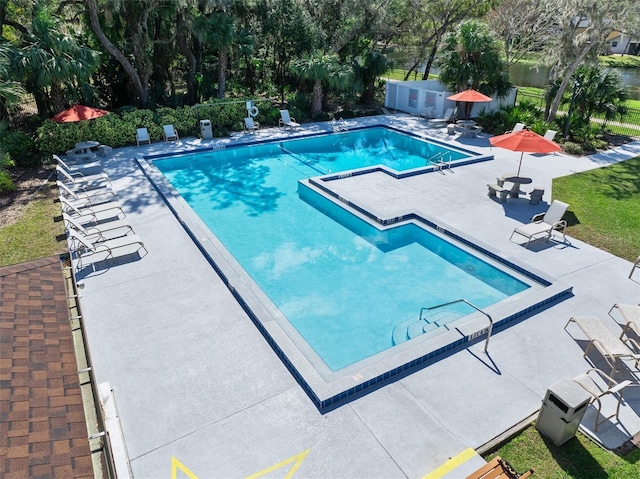 view of swimming pool featuring a patio