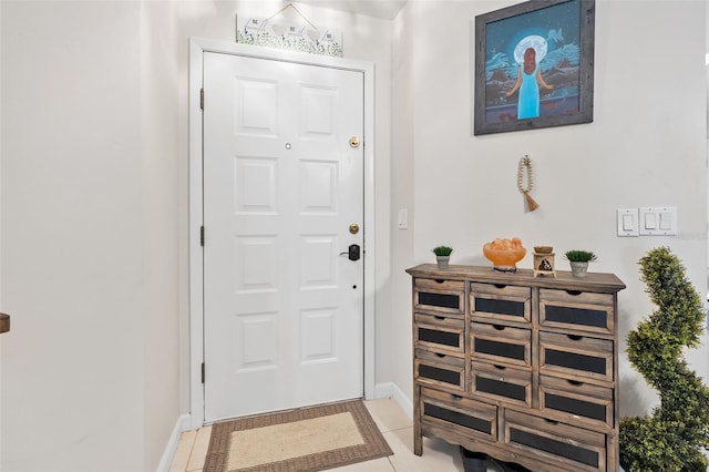 doorway featuring light tile patterned floors