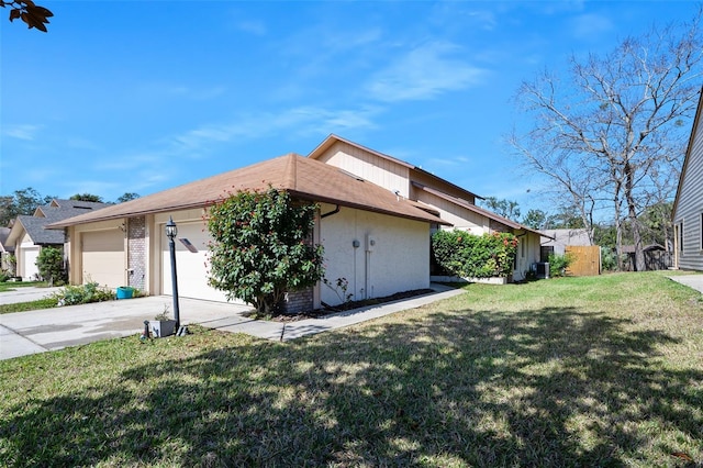 view of property exterior with a yard and central air condition unit