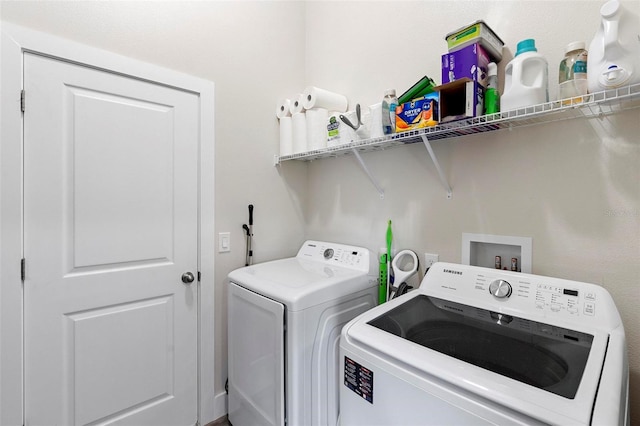 laundry room with washer and dryer