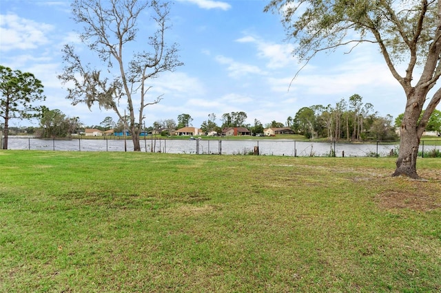 view of yard with a water view