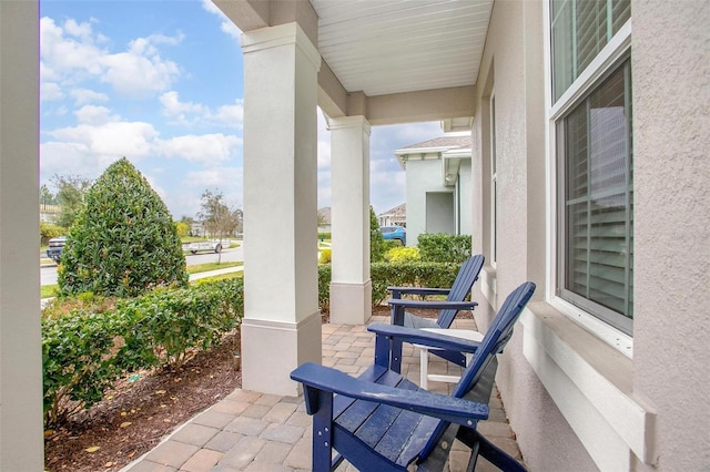 view of patio featuring a porch