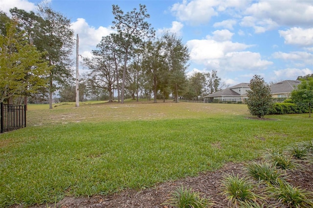 view of yard with fence