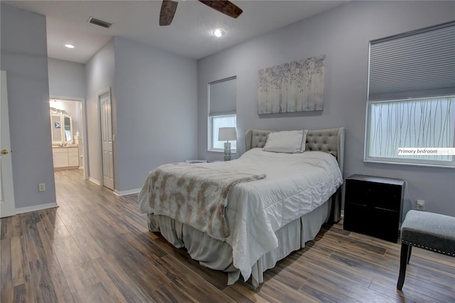 bedroom with dark wood-style floors, recessed lighting, visible vents, a ceiling fan, and baseboards