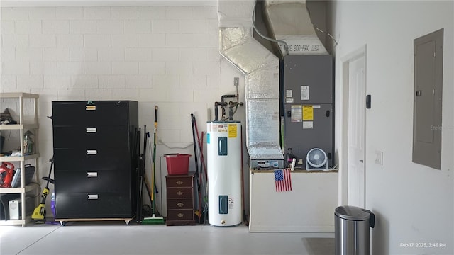 utility room featuring electric water heater and electric panel