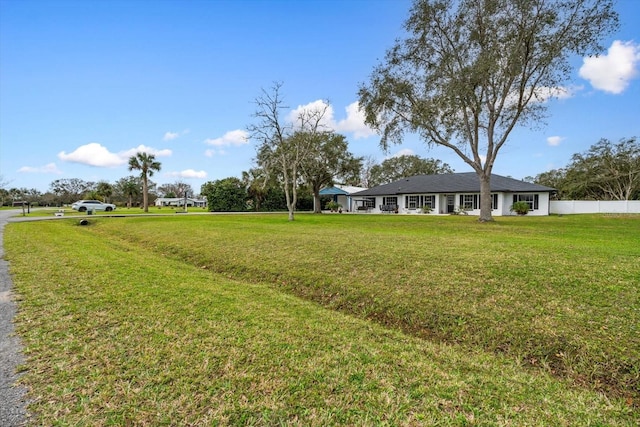 view of yard featuring fence