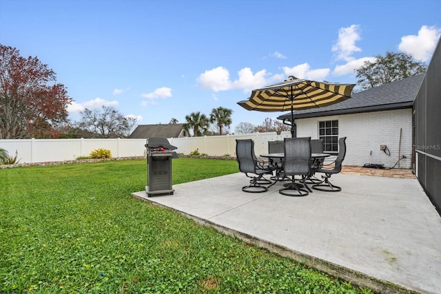 view of yard featuring a patio area and a fenced backyard