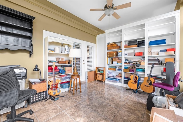 office area with ceiling fan, ornamental molding, and tile patterned flooring