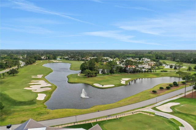 view of home's community featuring golf course view and a water view