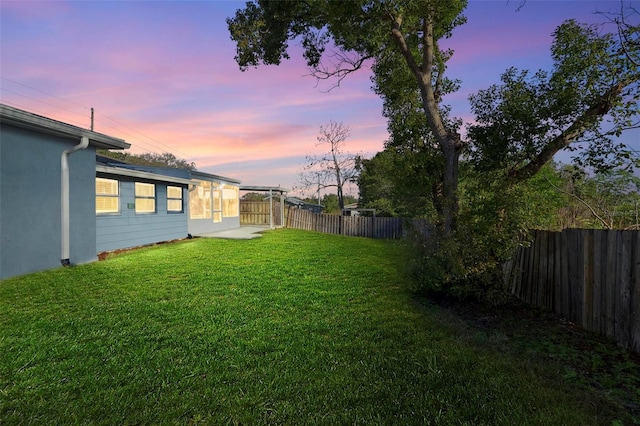 view of yard with a fenced backyard