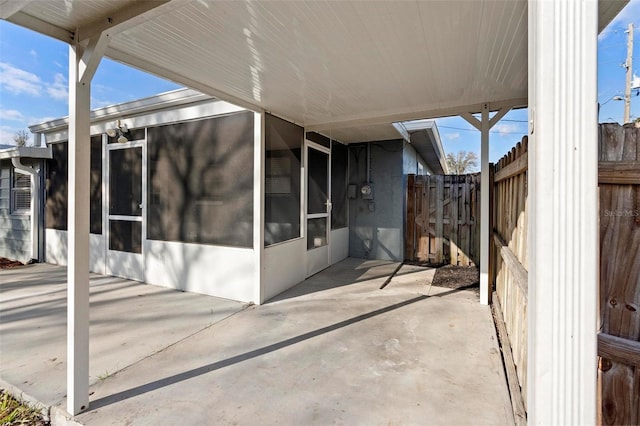 view of patio / terrace featuring fence