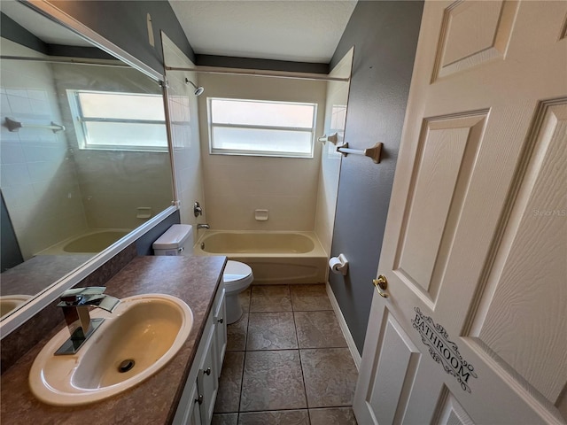 full bathroom featuring a textured ceiling, shower / tub combination, toilet, vanity, and baseboards