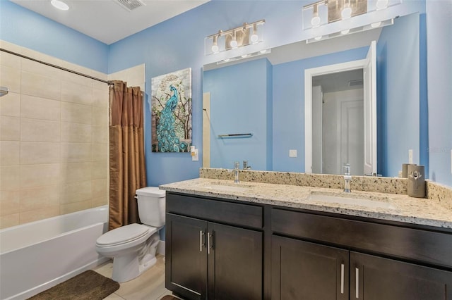 bathroom featuring a sink, shower / bathtub combination with curtain, toilet, and double vanity