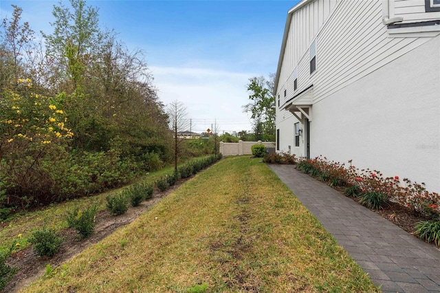 view of yard featuring fence