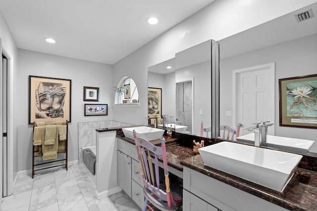 bathroom featuring double vanity, visible vents, marble finish floor, a sink, and recessed lighting