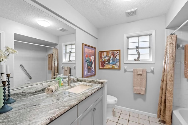 full bathroom featuring tile patterned flooring, visible vents, a textured ceiling, and toilet