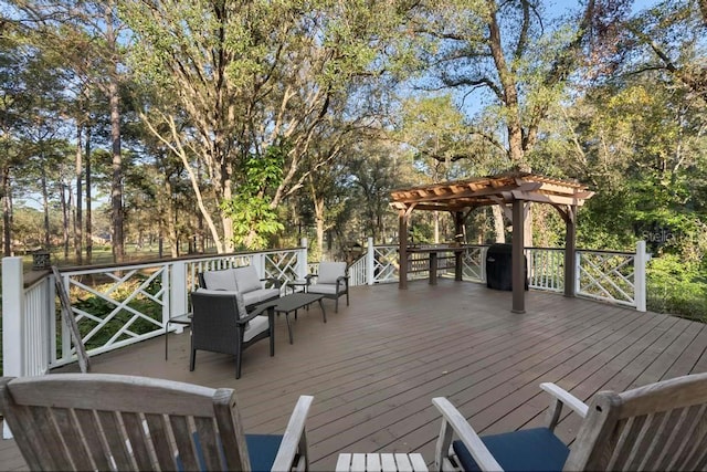 deck with an outdoor hangout area and a pergola