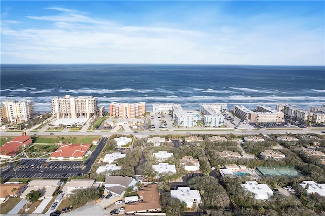 bird's eye view featuring a view of city and a water view